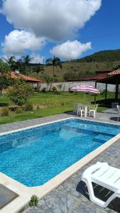 Swimmingpoolen hos eller tæt på Chácara do Sossego