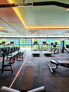 a gym with rows of chairs and a large window at Luxuoso e sofisticado Beach Class Verano by HM in Ipojuca