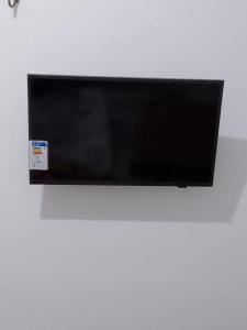 TV a/nebo společenská místnost v ubytování Apartamento Alto de São Manoel + 7 fotografií