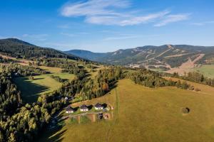 an aerial view of a house on a hill at Apartmány U Hešů in Horní Lipka