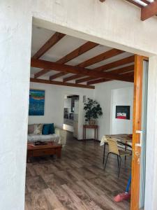 a living room with a couch and a table at Casa en Concon in Vina del Mar