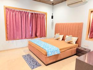 En eller flere senge i et værelse på The Grand Haven Vista + 38 billeder