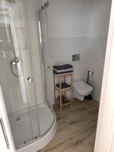Koupelna v ubytování Apartamenty - Stara Stajnia - Na krańcu Świata + 20 fotografií