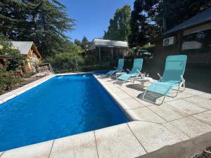 Bazén v ubytování Cabaña Soñada nebo v jeho okolí