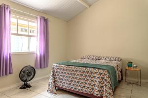 Postel nebo postele na pokoji v ubytování Casa de Férias