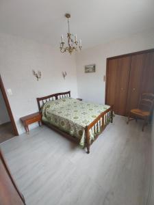 Giường trong phòng chung tại Appartement Le cabanon