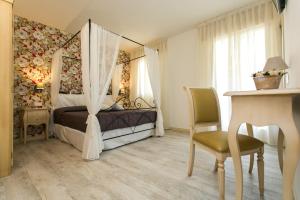Postel nebo postele na pokoji v ubytování Guest House Dolce Laguna
