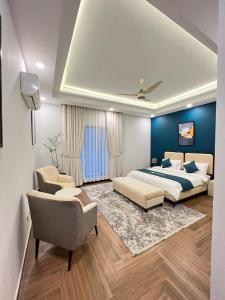 Postel nebo postele na pokoji v ubytování Comfort Family Lodges