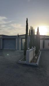 a parking lot with a building with a garage at شاليه ريفالا الفاخر in Abha +7 photos