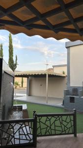 a view from the patio of a building with a fountain at شاليه ريفالا الفاخر in Abha