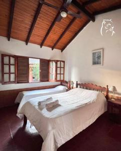 Postel nebo postele na pokoji v ubytování Posada Tupasy