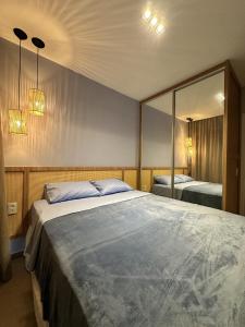 En eller flere senge i et værelse på NoMAR Premium - Tamandaré Carneiros