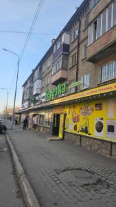 a building on the side of a street at Глинки 1комн in Semey