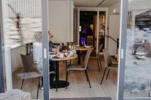 En restaurant eller et andet spisested på Mesnerhaus & Gourmetrestaurant Mesnerhaus mit 4 Hauben