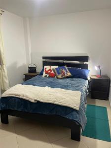 Postel nebo postele na pokoji v ubytování Hermoso apartamento en Barbosa Santander