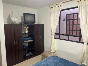 TV a/nebo společenská místnost v ubytování Hermoso apartamento en Barbosa Santander