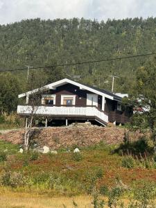 a house on top of a hill at Øse Camping in Gratangen