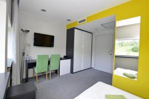 Et tv og/eller underholdning på Pokoje Ślężanskie