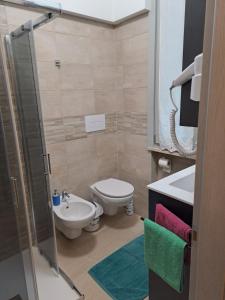 Et badeværelse på Vista Garda, Casa Vacanze + 8 billeder