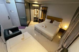 Postel nebo postele na pokoji v ubytování Hotel AL Amin By Ahmed