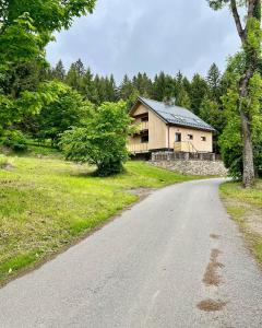 a house on the side of a road at Chalupa Bohunka in Kašperské Hory