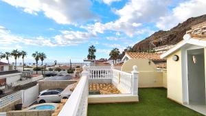 a view from the balcony of a house at HEI HEI AND PUA VILLA - heated pool, priv parking, fibre net, Palm-Mar in Palm-Mar