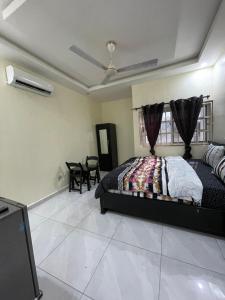 Postel nebo postele na pokoji v ubytování Danstels lodge