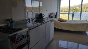 Køkken eller tekøkken på Punta El Tesoro - Playa Privada al Lago