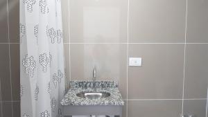 Et badeværelse på Punta El Tesoro - Playa Privada al Lago