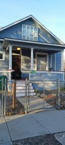 een huis met een hek ervoor bij Historic Reno Home in Reno