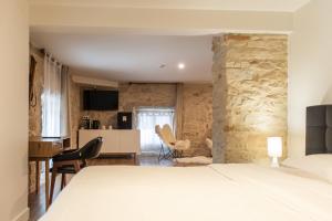 Et tv og/eller underholdning på Hôtel Séquoias