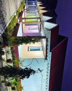 an architectural rendering of a building with plants at Pine Apple Resorts in Jalpāiguri