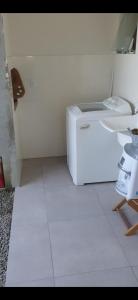 En eller flere senge i et værelse på Casa nova 2 quartos 1 garagem Morretes + 2 billeder