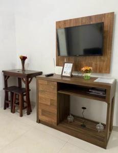 Et tv og/eller underholdning på Apartamento Aconchegante em Botafogo