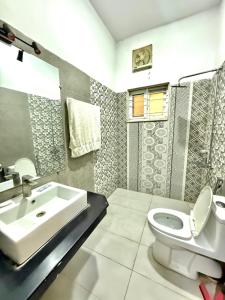 Et badeværelse på The Guest House Islamabad