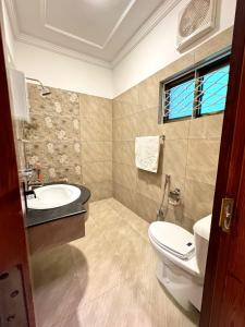 Et badeværelse på The Guest House Islamabad