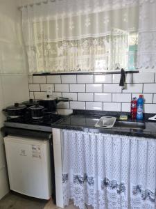 Kuchyň nebo kuchyňský kout v ubytování Vista para o Mar em Angra - 5 min do Centro