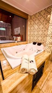 Phòng tắm tại Pousada Bosque