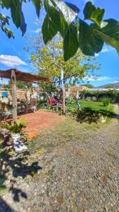 a backyard with a playground with a table and chairs at Huaka Guesthouse and Hostel in Cafayate