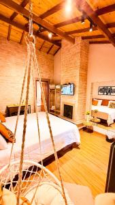 Giường trong phòng chung tại Pousada Bosque