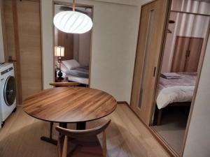 Giường trong phòng chung tại 源氏民宿