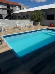 Swimmingpoolen hos eller tæt på Hotel Tropical + 5 billeder