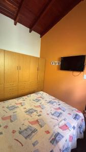 En eller flere senge i et værelse på Ariel Reynoso - Departamento Planta Baja + 2 billeder