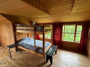 En eller flere senge i et værelse på Casa de campo Laguna escondida