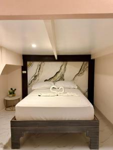 En eller flere senge i et værelse på Violegre Homestay + 14 billeder