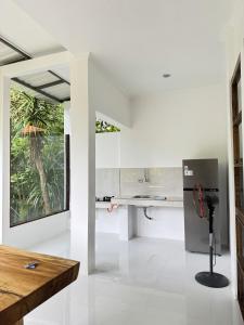 Køkken eller tekøkken på Pier26 Bali Homestay