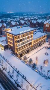 an aerial view of a hotel in the snow at Mercure Changbai Mountain North in Antu