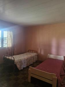 En eller flere senge i et værelse på El Paraiso