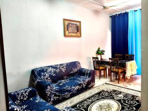 Posezení v ubytování Homestay Bonda D'