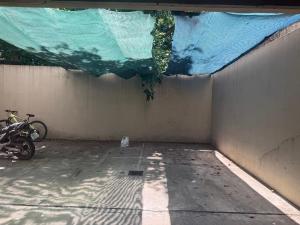 a covering on a wall next to a motorcycle at Cálido dpto en pleno centro in Corrientes